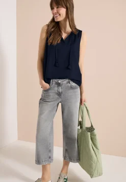 Blousetop met gespleten hals en linten