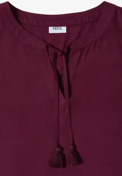 Blousetop met gespleten hals en linten