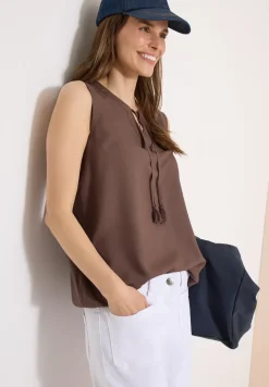 Blousetop met gespleten hals en linten