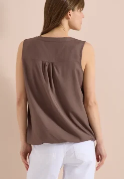 Blousetop met gespleten hals en linten