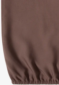 Blousetop met gespleten hals en linten
