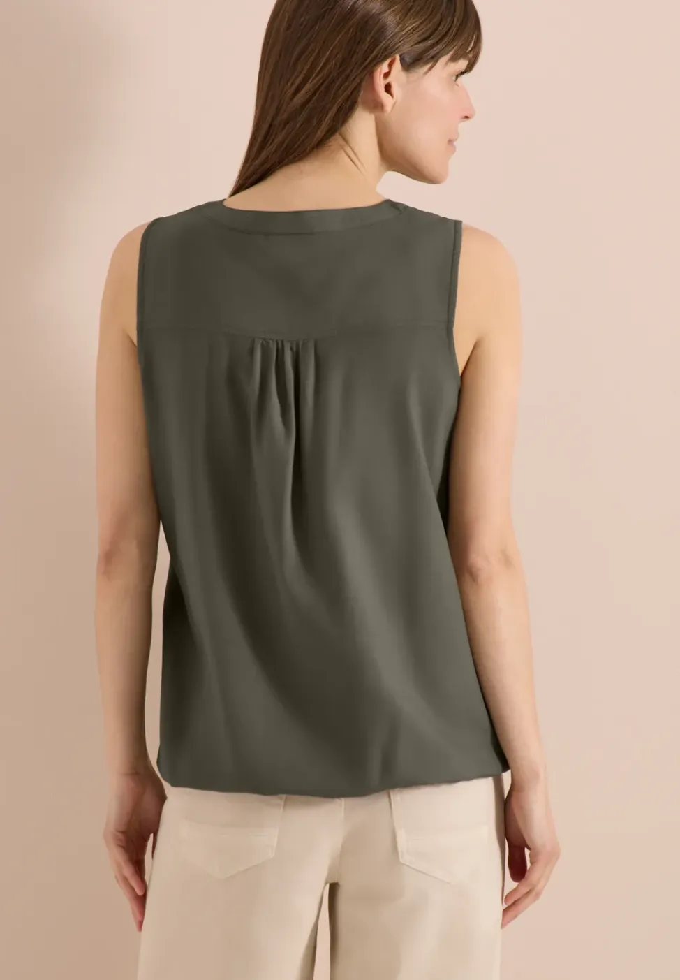 Blousetop met gespleten hals en linten