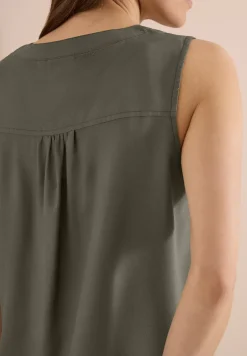 Blousetop met gespleten hals en linten