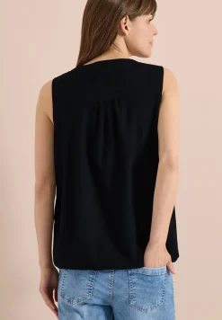 Blousetop met gespleten hals en linten