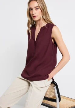 Blousetop met gespleten hals