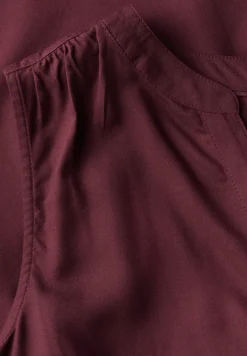 Blousetop met gespleten hals