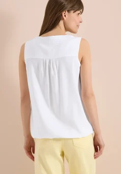 Blousetop met gespleten hals en linten