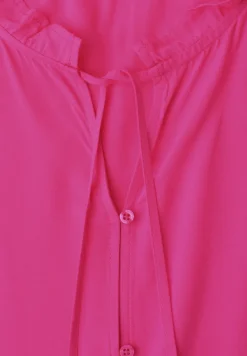 Blousetop met gespleten hals en ruches