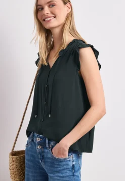Blousetop met gespleten hals en ruches