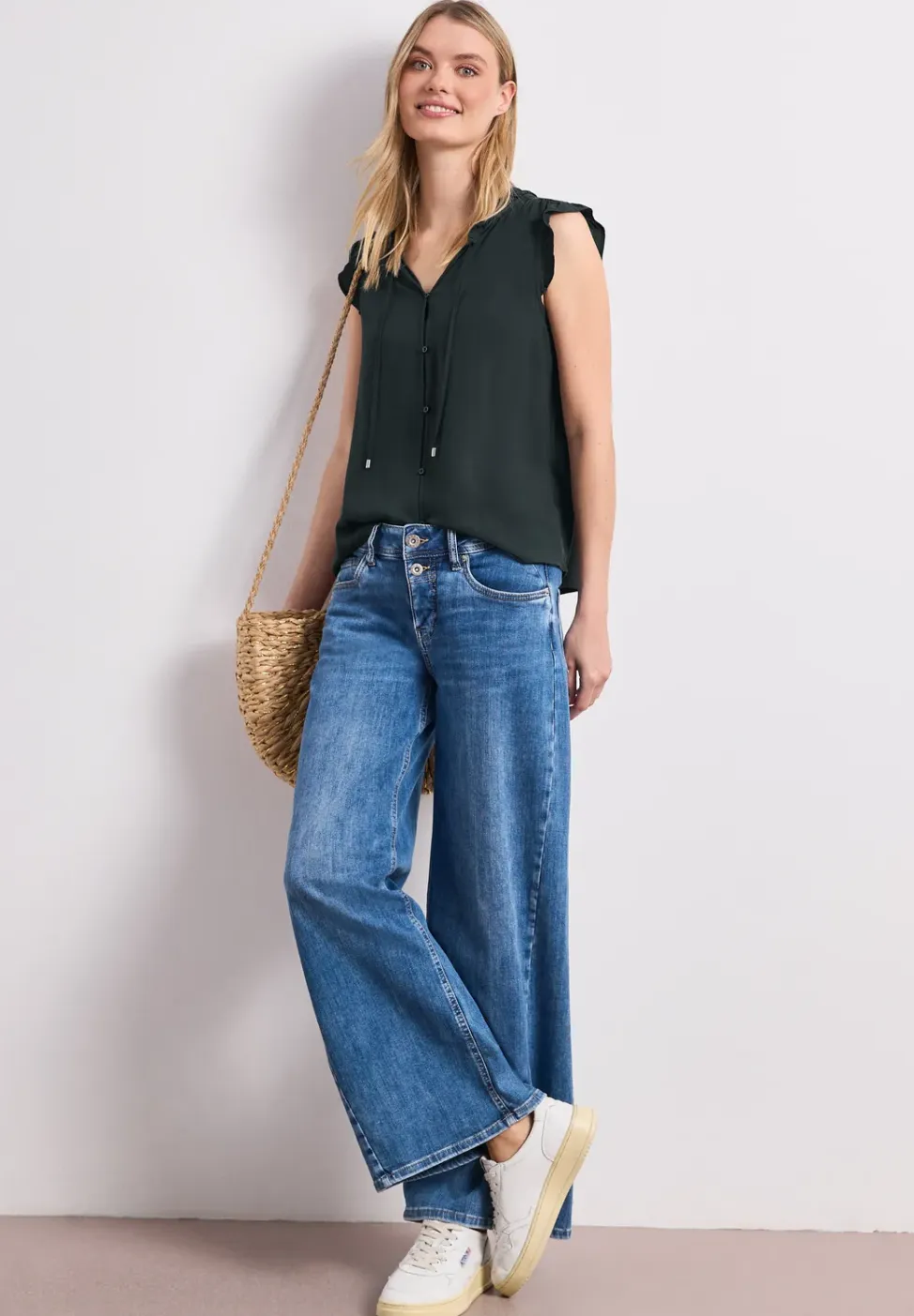 Blousetop met gespleten hals en ruches