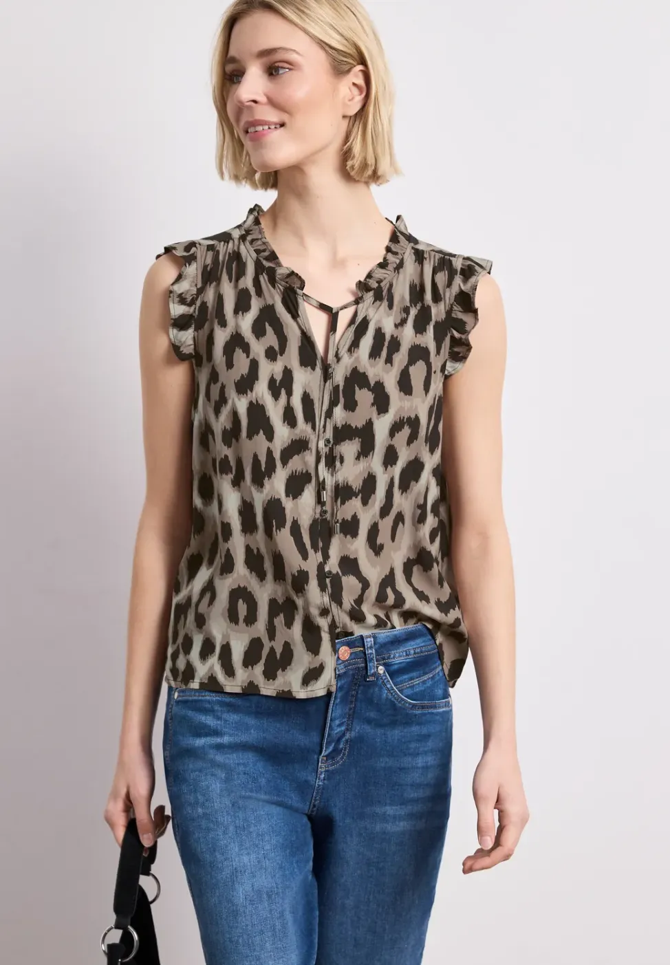 Blousetop met gespleten hals en ruches