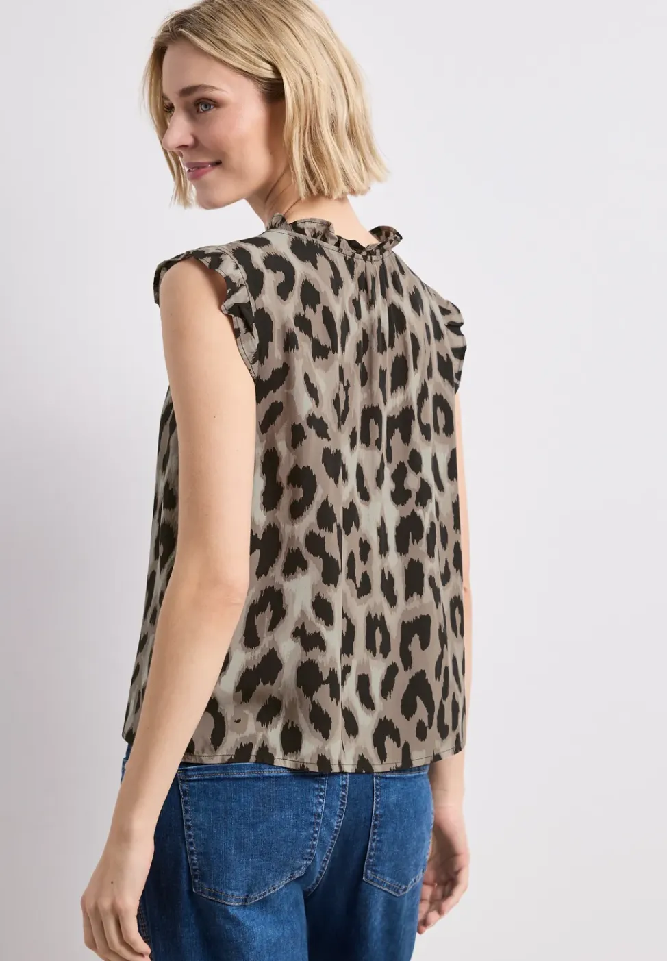 Blousetop met gespleten hals en ruches
