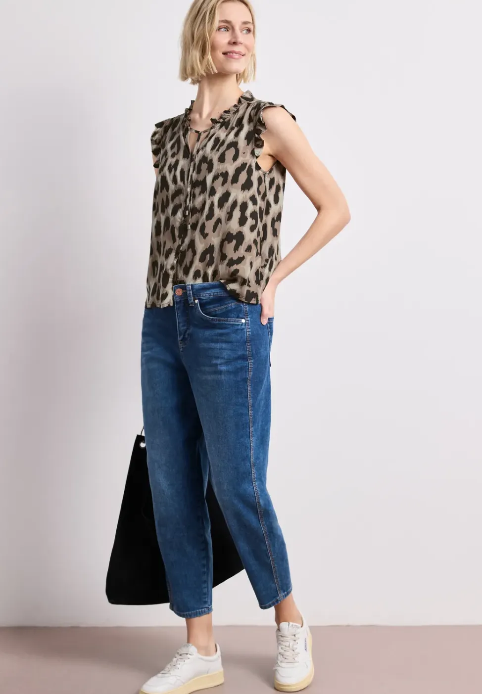 Blousetop met gespleten hals en ruches