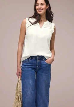 Blousetop met gespleten hals en shiffley-details