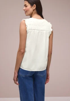 Blousetop met gespleten hals en shiffley-details