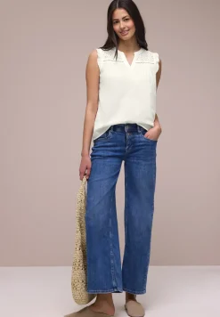 Blousetop met gespleten hals en shiffley-details