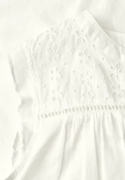 Blousetop met gespleten hals en shiffley-details