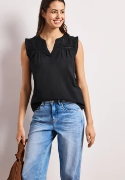 Blousetop met gespleten hals en shiffley-details