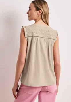 Blousetop met gespleten hals en shiffley-details