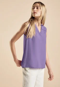 Blousetop met tapedetail