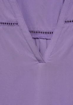 Blousetop met tapedetail