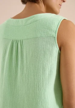 Blousetop met V-hals van mousseline