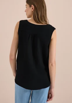 Blousetop met V-hals van mousseline