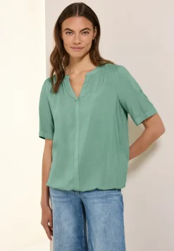 Blouse van viscose met gespleten hals