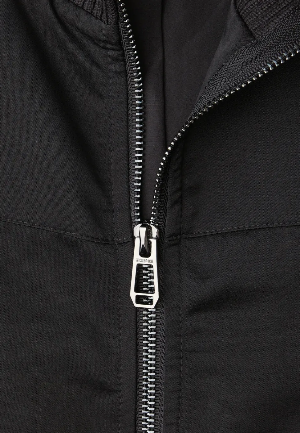 Blouson met college details