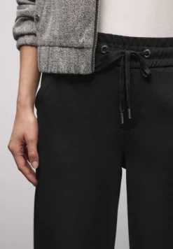 Broek met rechte pijpen en tape