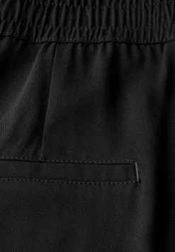 Broek met wijde pijpen in keperstof