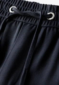 Broek met wijde pijpen in keperstof