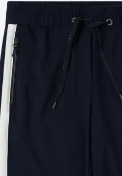 Broek met colour block tape