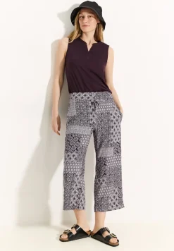 Broek met patchworkprint