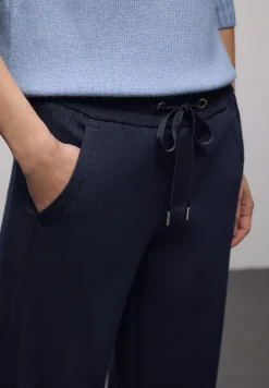 Broek met rechte pijpen en tape