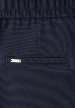 Broek met rechte pijpen en tape