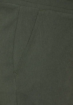 Broek met wijde pijpen en structuur