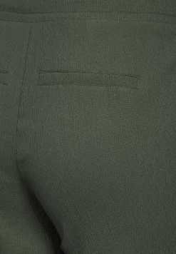 Broek met wijde pijpen en structuur