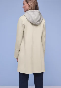 Coat met inlegwerk