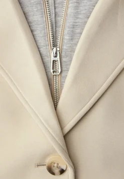 Coat met inlegwerk