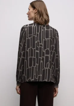 Gedessineerde tuniek met tape