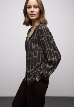 Gedessineerde tuniek met tape