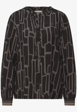 Gedessineerde tuniek met tape