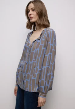 Gedessineerde tuniek met tape