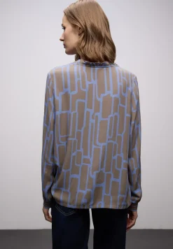 Gedessineerde tuniek met tape