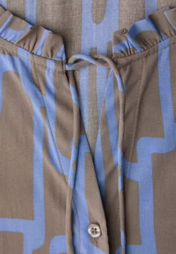 Gedessineerde tuniek met tape