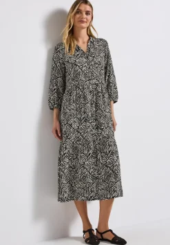 Gedessineerde volant jurk