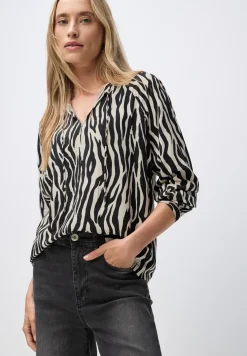 Gedessineerde raglan tuniek
