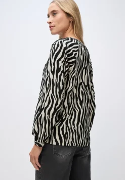 Gedessineerde raglan tuniek