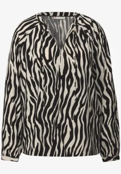 Gedessineerde raglan tuniek